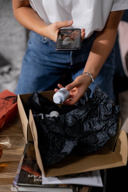 Collector inspecting a blind box figure closely